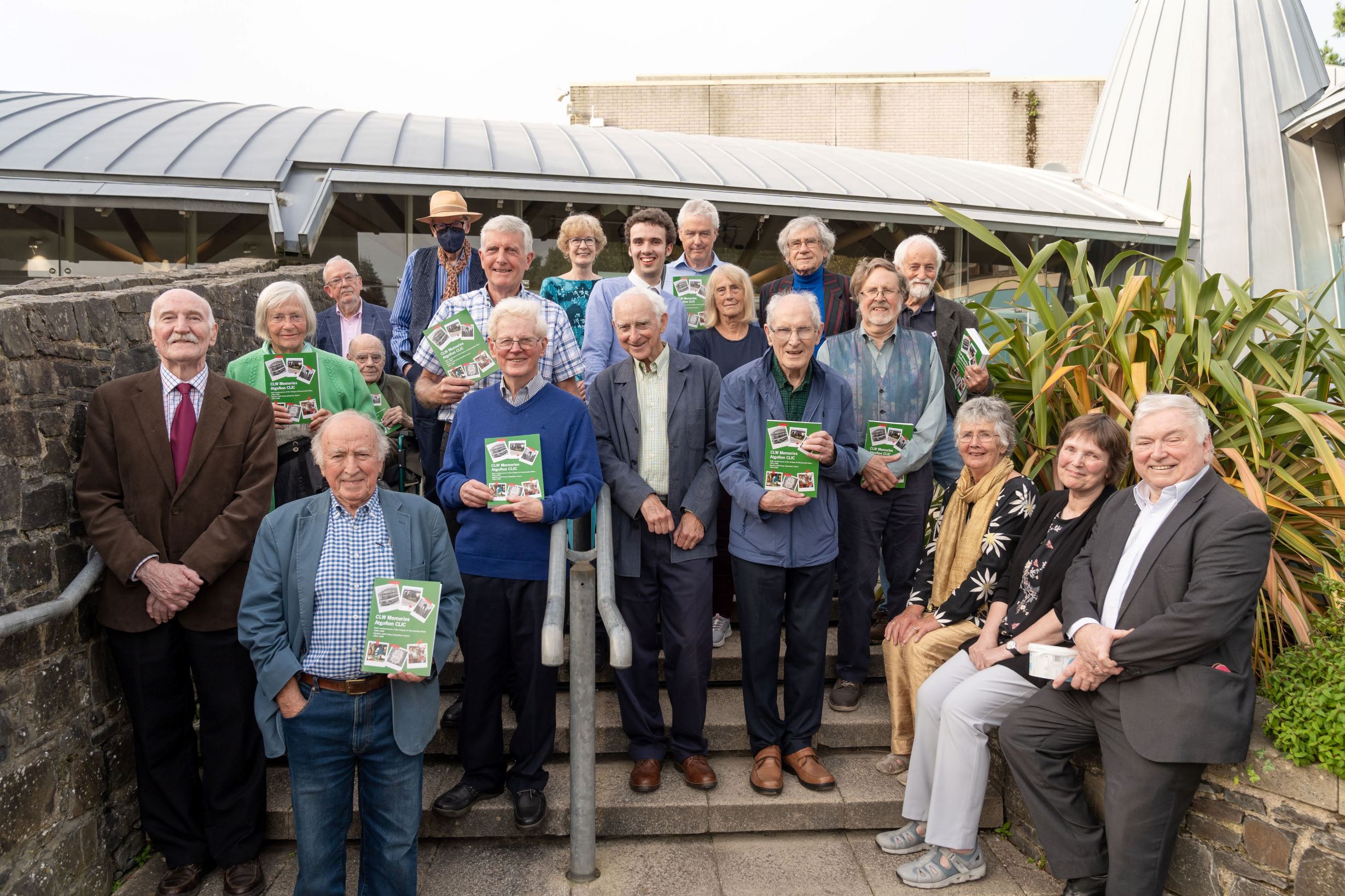 Group image of 20 contributors to the book